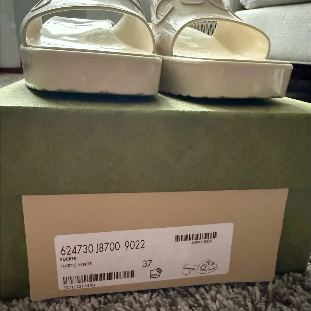 Gucci Cream Embossed Logo Slide Sandals - Picture 12 of 16